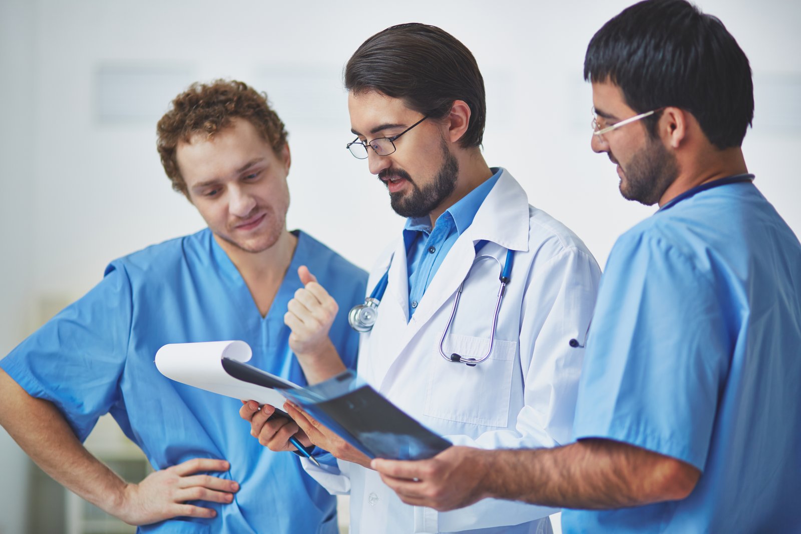 TrueCare RCM team reviewing a patient chart together